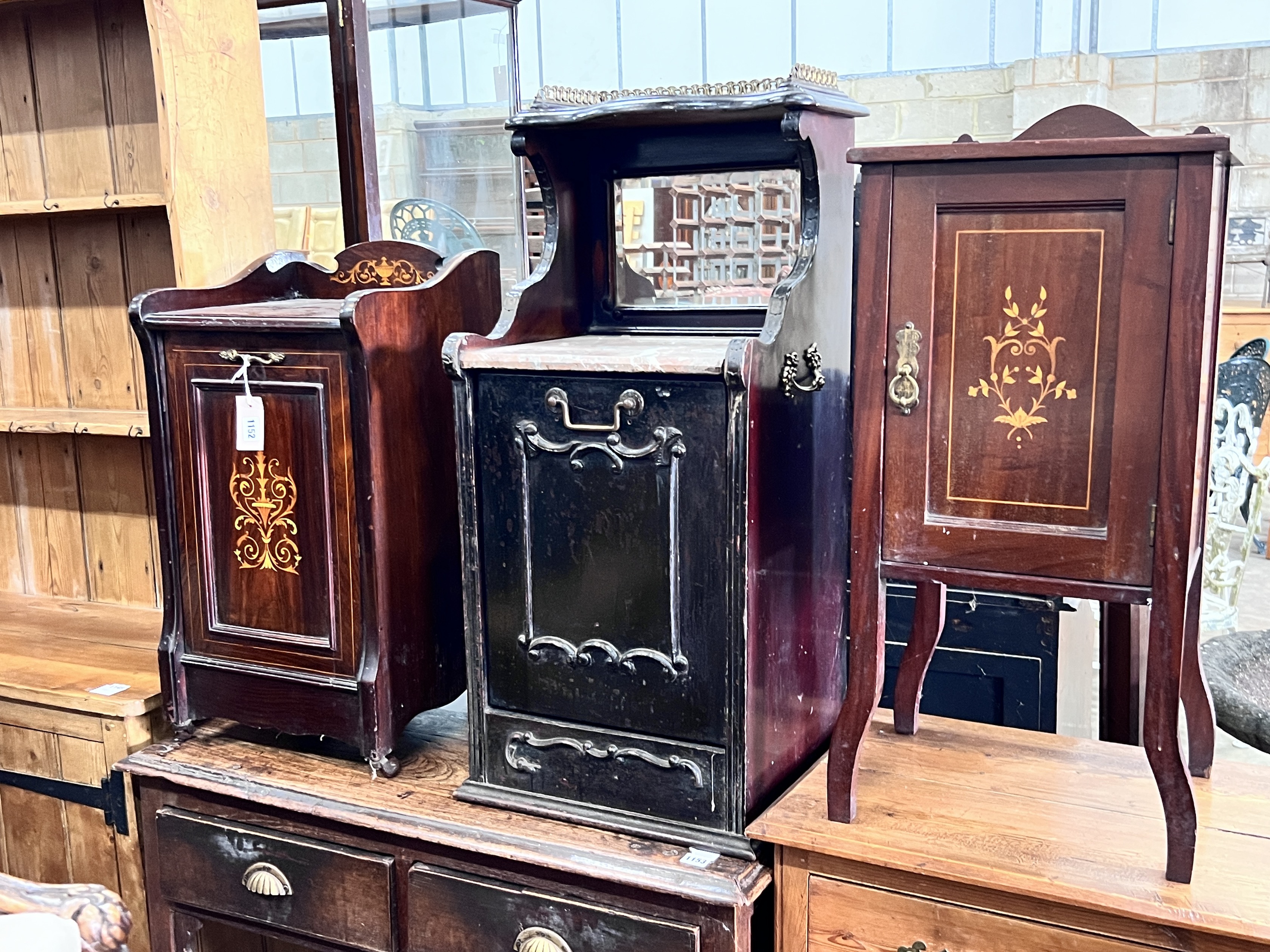 Two Victorian mahogany and rosewood coal purdoniums and a later bedside cabinet, largest width 39cm, depth 35cm, height 90cm